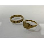 A signet style ring marked 9ct (M/N) and another Birmingham hallmarked 9ct gold ring (N) (