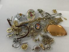 A quantity of costume jewellery including chains, brooches, earrings, rings, charms, also two kilt