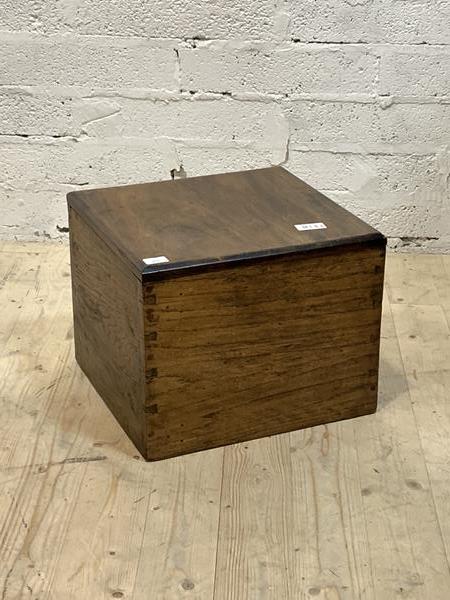 An oak lidded box of dovetail construction with divisions to interior, H35cm, W44cm, D40cm