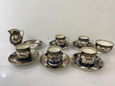 A set of five 19thc. Booths demi tasse cups and six saucers with floral, bird and inset decoration