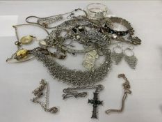 A collection of costume jewellery, some silver including crucifix, chains, earrings, bangles etc (