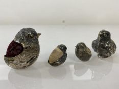 A group of four silver pin cushions, Sampson Mordan and Co, hatching chick , three hatchling