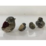 A group of four silver pin cushions, Sampson Mordan and Co, hatching chick , three hatchling