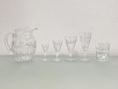 An extensive service of cut-glass stemware, 20th century, the wine, liqueur and sherry glasses