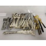 A quantity of Epns including spoons, forks, knives, soup spoons, also stainless steel spoons and