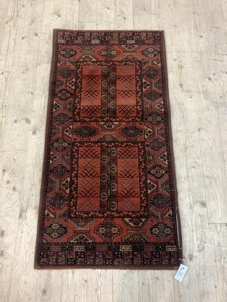 A Persian design runner rug with lozenge motif, 136cm x 68cm