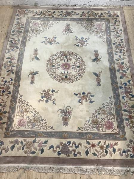A Chinese super washed wool carpet, the ivory field with medallion and spandrels, 388CM X 276CM