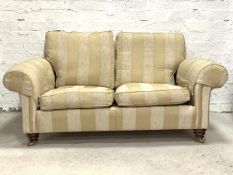 Duresta, A traditional two seat sofa, upholstered in a striped pale gold and ivory chinelle type