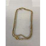 A 9ct gold curb link chain (26cm) weighs 6.05 grammes