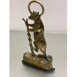 A 19thc cast brass Bear and Tree doorstop, mounted on cast iron base (h.36cm x 20cm x 5cm)