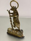 A 19thc cast brass Bear and Tree doorstop, mounted on cast iron base (h.36cm x 20cm x 5cm)
