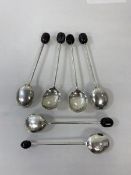 A set of five 1956 Sheffield hallmarked silver coffee bean spoons (each: 10cm) and a single