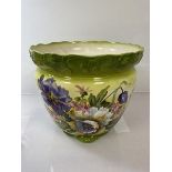 An early 20thc jardiniere with foliate decoration, with scalloped edge and foot (27cm x 32cm)