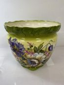 An early 20thc jardiniere with foliate decoration, with scalloped edge and foot (27cm x 32cm)