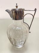 An Edwardian etched glass claret jug with Epns mount, (h 19cm d 10cm approximately)