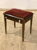 An Edwardian music stool with upholstered hinged top, H50cm, W36cm, D48cm