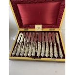 An early 20thc Walker & Hall canteen containing Epns set of 12 knives and forks, (6cm x 35cm x