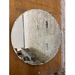 A 1930's / 40's frameless circular wall mirror with bevelled edge, (45cm d)