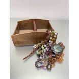 A treen housemaid's style box and a collection of costume jewellery including shell necklace,