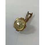 A first half of 20thc ladies' wrist watch marked .375 gold to case and strap marked 9ct, (dial 2cm x