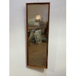 A mid century teak oblong wall mirror, (including frame 95cm x 33cm)