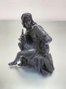 A seated spelter cast figure of Robert the Bruce (from 19thc mantel clock), (h 23cm x 21cm x 9cm)