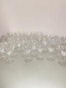 A large suite of Austrian crystal glasses including fourteen red wine large fluted glasses, twelve