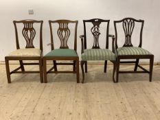 A matched set of four late 19th century Georgian style mahogany dining chairs, carver measures