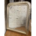 A modern silvered frame wall mirror, rectangular bevelled glass within moulded and dentil detail, (