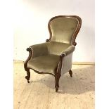 A Victorian mahogany spoon back drawing room chair, with scrolled show frame enclosing upholstered