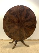 A 19th century mahogany centre or dining table, the well figured circular tilt top on four splayed