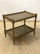 A dry oak two tier side table, raised on turned supports, H61cm, W71cm, D45cm