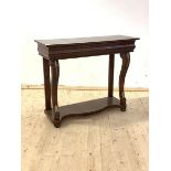 A Georgian style mahogany console table, the frieze with cushion drawer, raised on scrolled cabriole