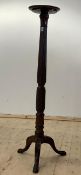 A Georgian style mahogany torchere, H151cm