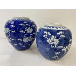 A Chinese ginger jar, lacking lid, with prunis decoration, four blue character marks to base (h