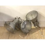A set of three mid century industrial aluminium floodlights, stamped Crompton Made in England L39cm