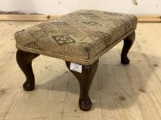 A 1930s upholstered footstool raised on cabriole supports, H20cm, W40cm, D28cm