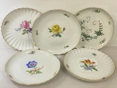 A set of five Meissen dinner plates with floral decoration, blue crossed swords to base, (d 28cm)