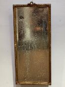 Late 19thc French gilt rectangular wall mirror with c scroll and ribbon knop with reeded border