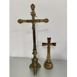 Two ecclesiastical brass crucifixes, both depicting Jesus on cross below INRI, (h 87cm)