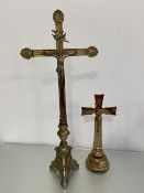 Two ecclesiastical brass crucifixes, both depicting Jesus on cross below INRI, (h 87cm)