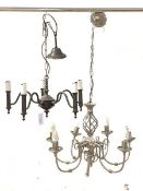 Two chandeliers, one seven branch and silvered (H26cm) and a bronzed five branch (H40cm)