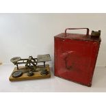 A set of shop scales and a red petrol can (h 34cm)