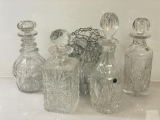 A group of four decanters, two with Bridge Crystal labels, (h 30cm), one marked Made in Edinburgh,