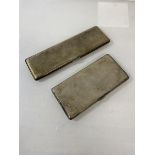 A silver double stack cigarette case, Birmingham 1935, (17cm x 5cm) and another silver cigarette