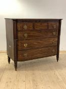 A Scottish Regency period mahogany bow front chest of drawers, the reeded top over three short and