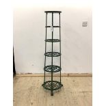A green pained cast metal pan stand, with six graduated tiers, raised on paw supports, H123cm,