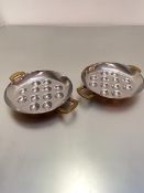 A pair of white metal lined brass handled copper escargot serving dishes, (h 3.5cm x d 21cm)