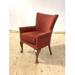 A 1930's walnut framed and upholstered bedroom chair, raised on cabriole supports, H76cm, W63cm,