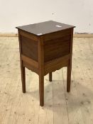 An early 20th century mahogany sewing table, the hinged top over drawer to side, raised on square